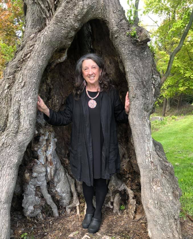 Photo of Karen Pillsworth In a Tree Trunk